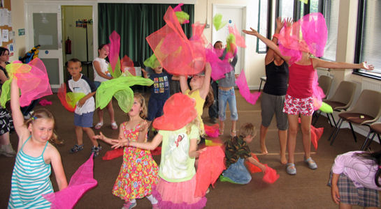 Juggling scarves at a Circus Skills party.